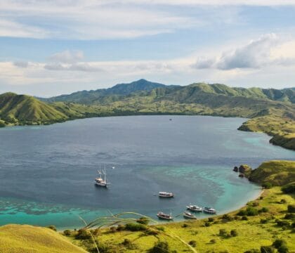 Aerial photo of liveaboards in water near Padar Island in Komodo National Park